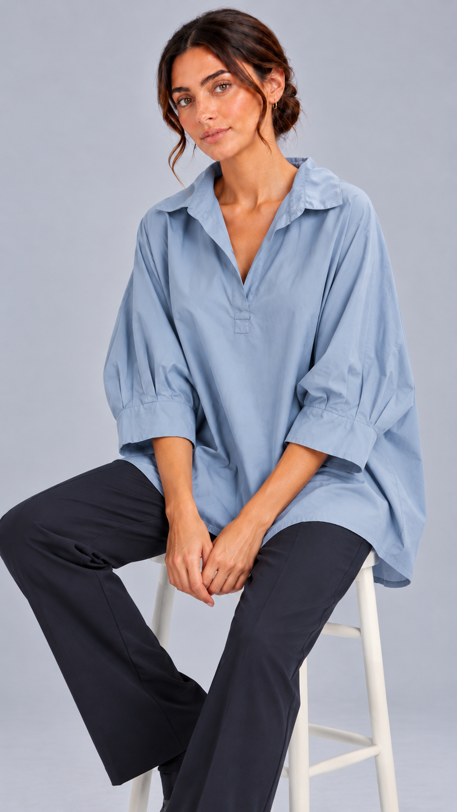 Blusa in azzurro polvere