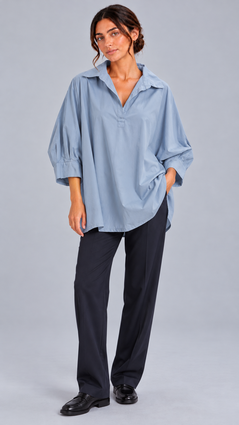 Blusa in azzurro polvere